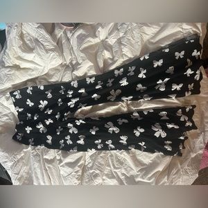 Black warm pants with bows